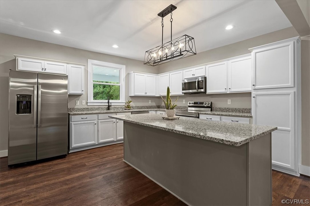 6704 Courthouse Road Church Road, VA 23833 - Photo 4 of 27 a kitchen with stainless steel appliances granite countertop a sink a stove a refrigerator cabinets and a kitchen island