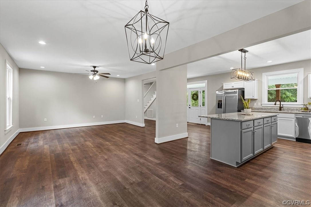 6704 Courthouse Road Church Road, VA 23833 - Photo 6 of 27 a living room with kitchen island granite countertop furniture and a wooden floor