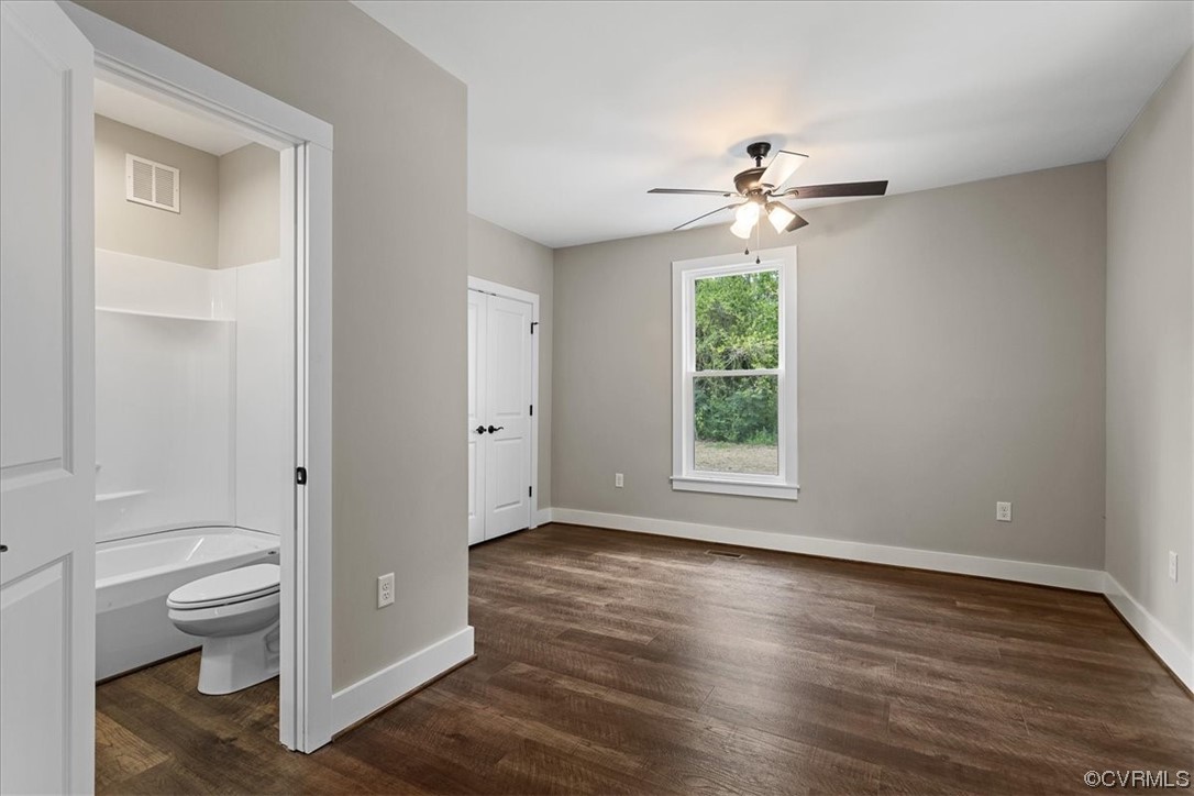 6704 Courthouse Road Church Road, VA 23833 - Photo 10 of 27 a view of an empty room with a window and wooden floor