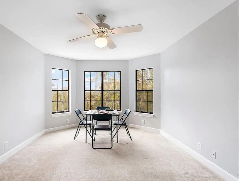1525 Black Island Road Darien, GA 31305 - Photo 16 of 41 a dining room with furniture and window