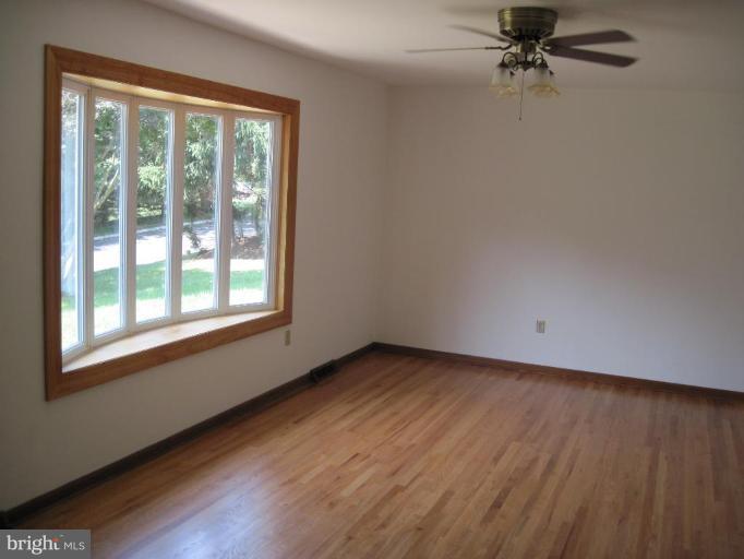 2511 Fox Road Fallston, MD 21047 - Photo 3 of 30 a view of a livingroom with a hardwood floor and a window