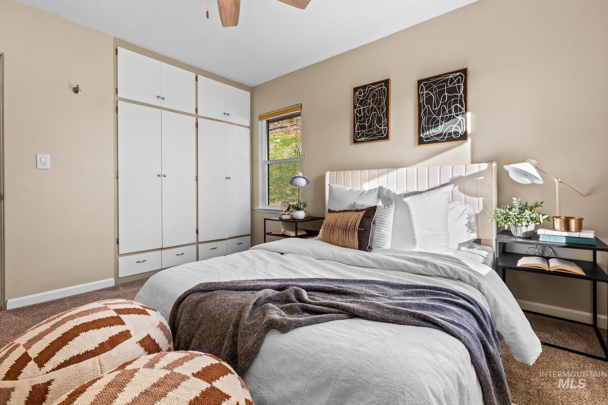300 West Ofarrell Street Boise, ID 83702 - Photo 23 of 50 Carpeted bedroom with a closet and a ceiling fan