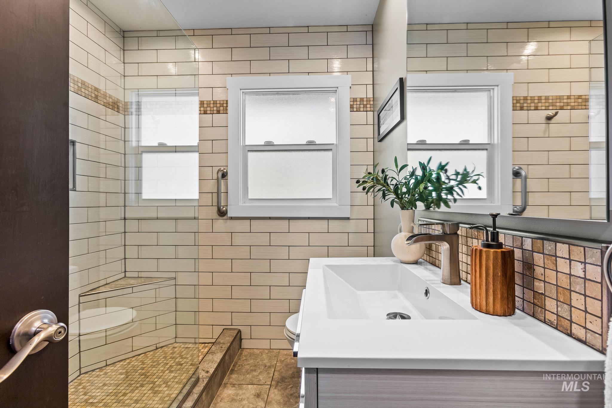 300 West Ofarrell Street Boise, ID 83702 - Photo 24 of 50 Bathroom featuring vanity and toilet