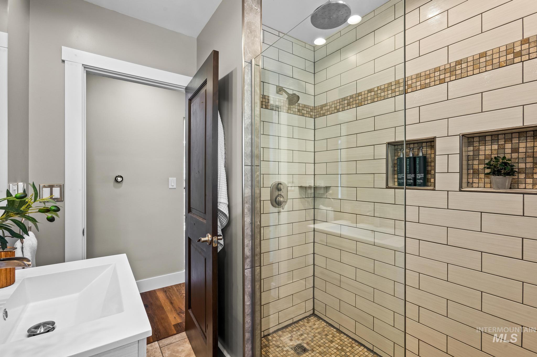 300 West Ofarrell Street Boise, ID 83702 - Photo 25 of 50 Bathroom featuring vanity and a shower stall