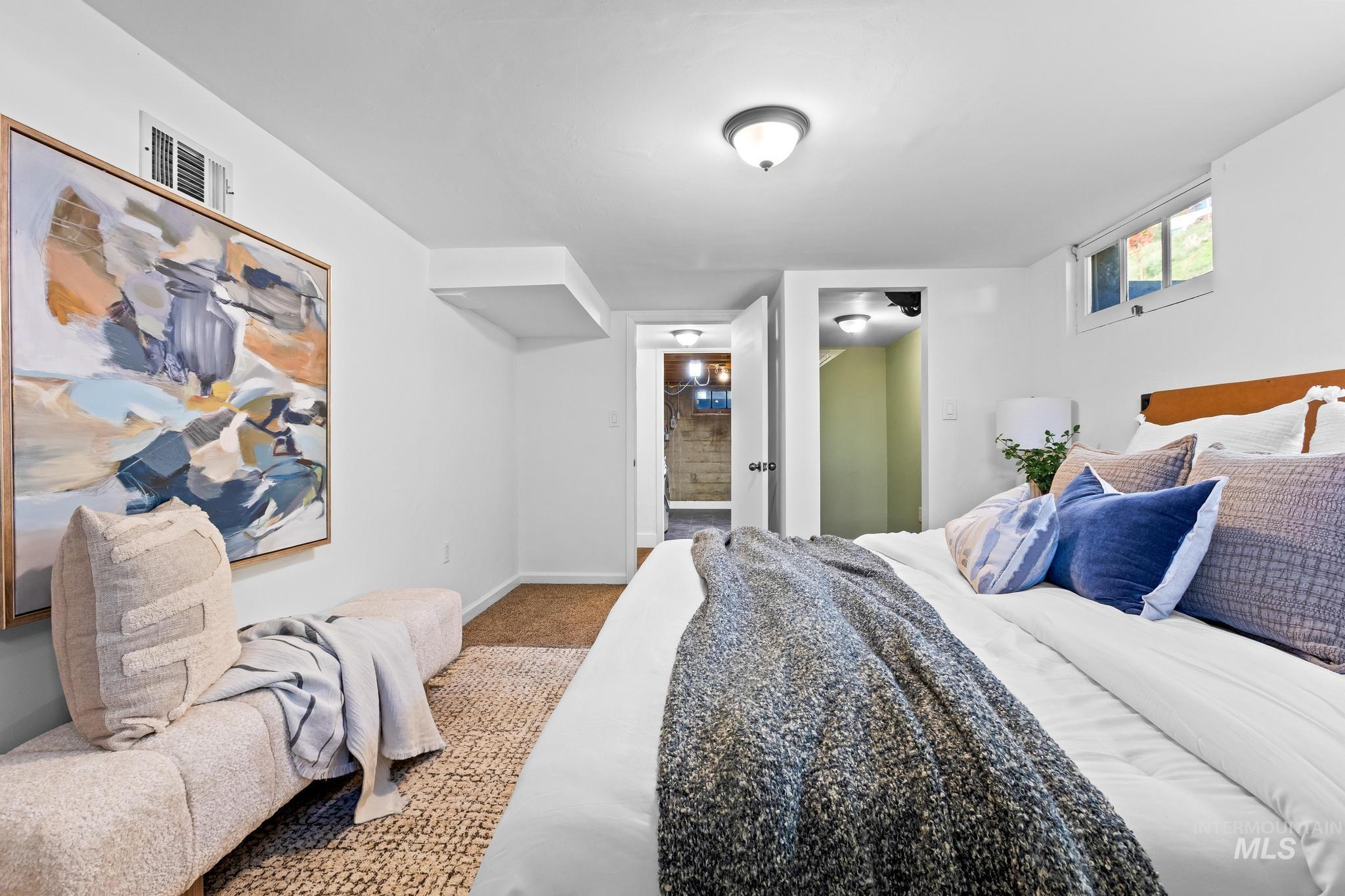 300 West Ofarrell Street Boise, ID 83702 - Photo 31 of 50 Bedroom with carpet floors and ensuite bath