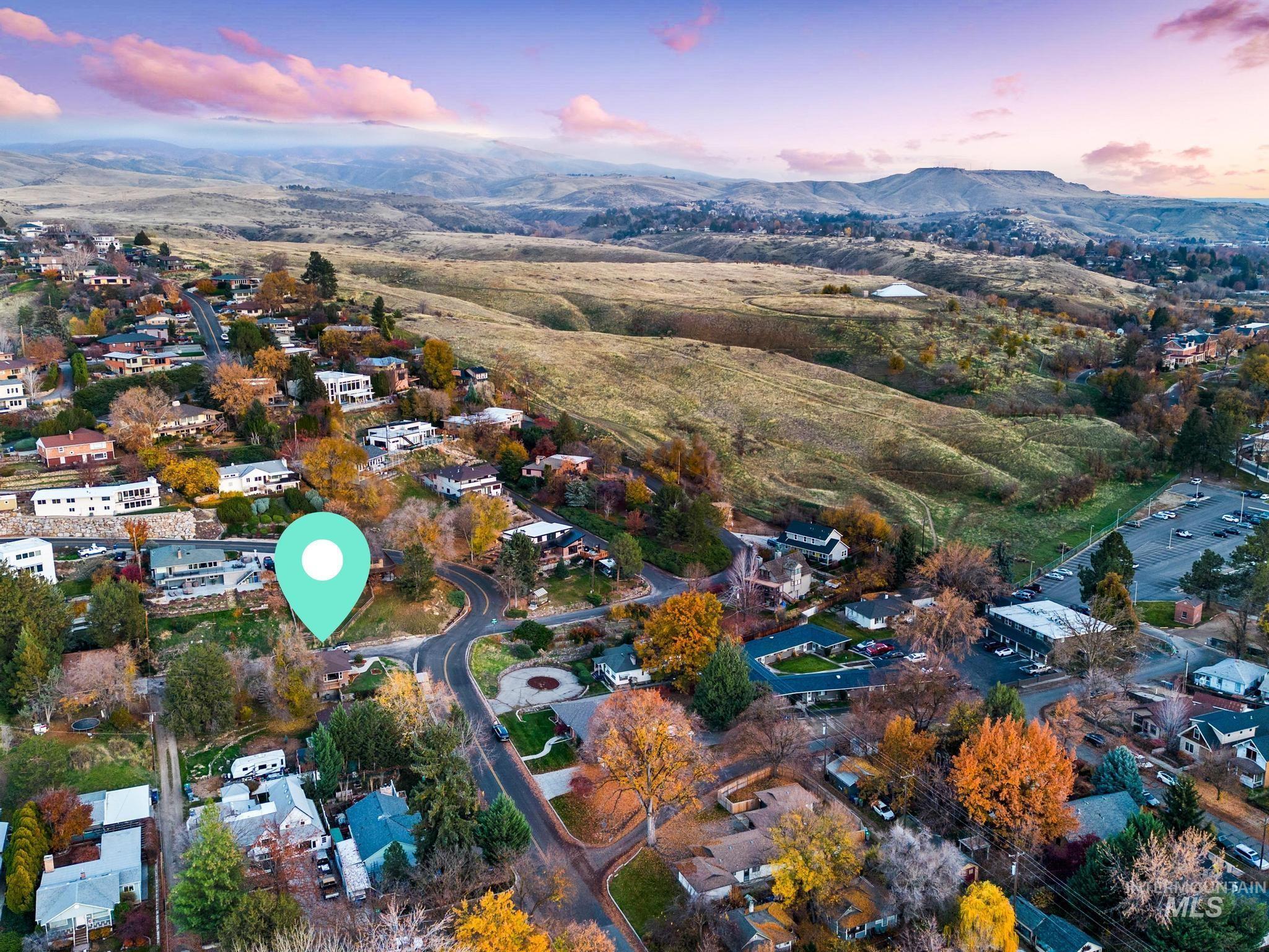 300 West Ofarrell Street Boise, ID 83702 - Photo 49 of 50 Aerial view at dusk of a mountain view and a residential view