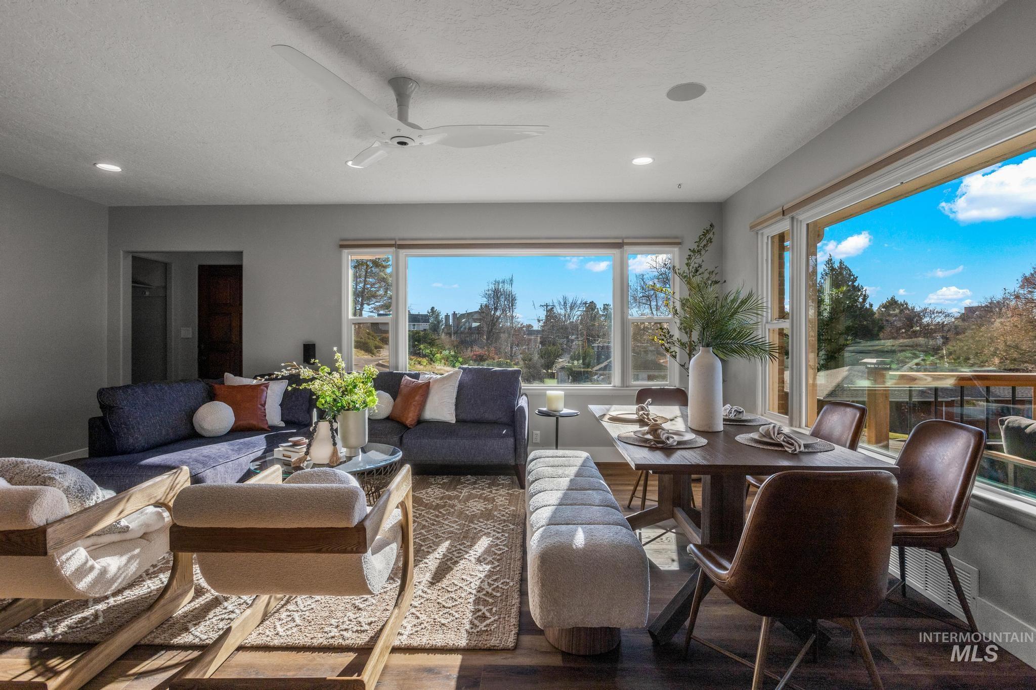 300 West Ofarrell Street Boise, ID 83702 - Photo 10 of 50 Living area featuring wood finished floors, ceiling fan, recessed lighting, and a textured ceiling
