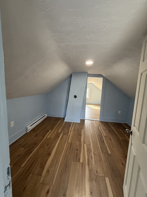 34 Garfield Street, Unit 2 Taunton, MA 02780 - Photo 5 of 10 a view of empty room with wooden floor