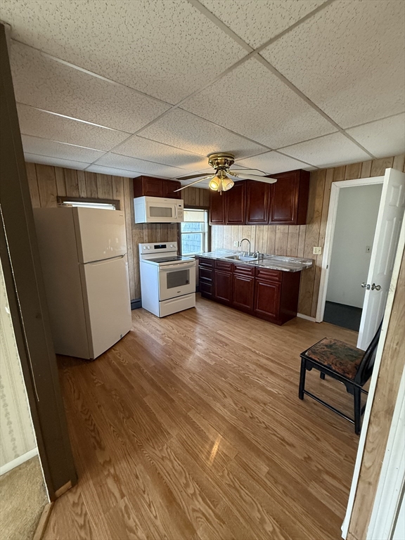 34 Garfield Street, Unit 2 Taunton, MA 02780 - Photo 10 of 10 a view of kitchen with furniture and a refrigerator