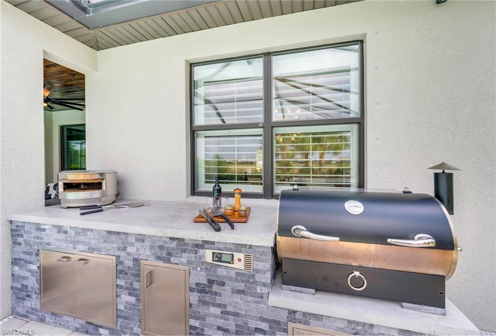 19812 Beechcrest Place Estero, FL 33928 - Photo 16 of 50 a room with furniture and window