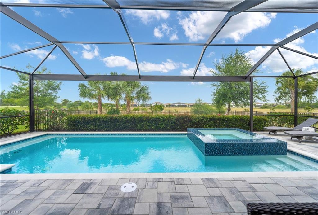 19812 Beechcrest Place Estero, FL 33928 - Photo 17 of 50 a view of swimming pool from a balcony