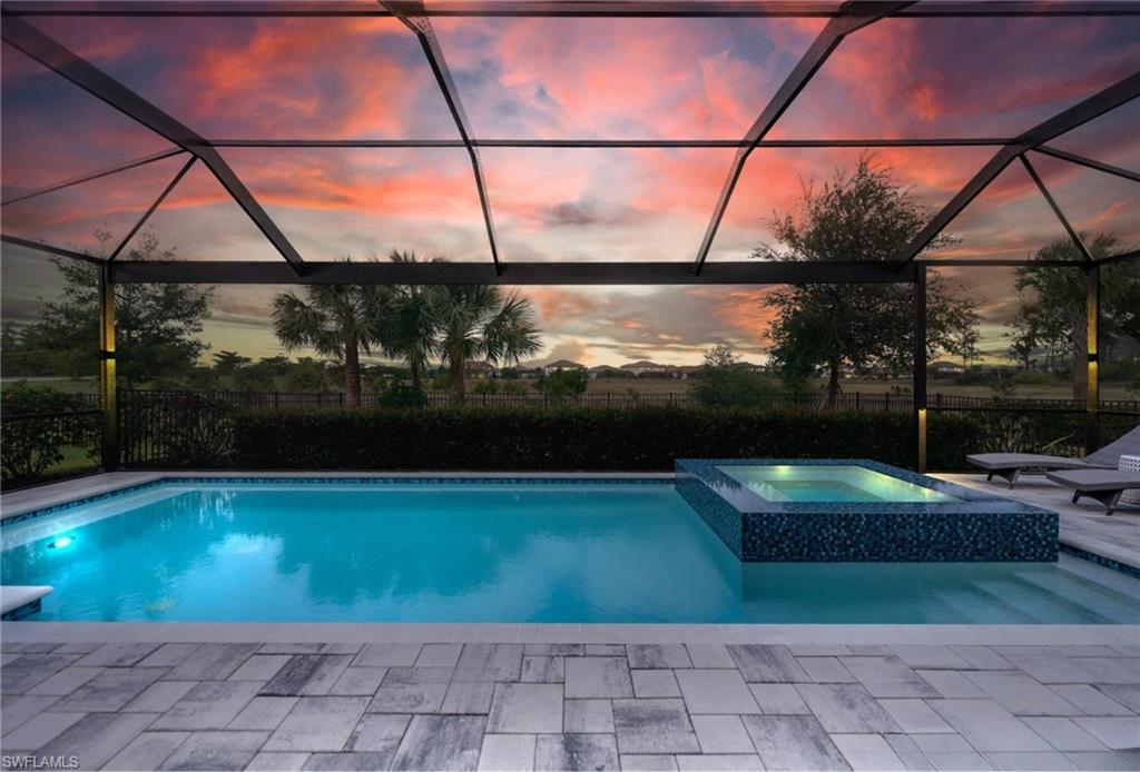 19812 Beechcrest Place Estero, FL 33928 - Photo 3 of 50 a view of swimming pool from a balcony