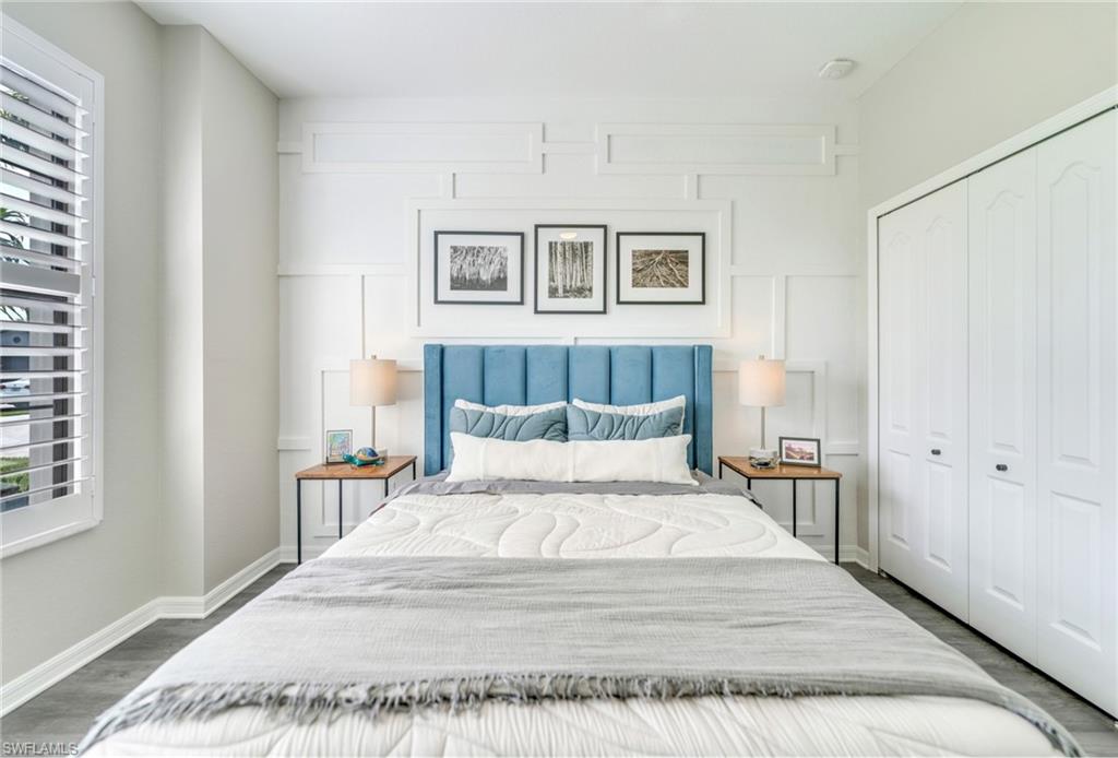 19812 Beechcrest Place Estero, FL 33928 - Photo 31 of 50 a bedroom with a large bed and a window