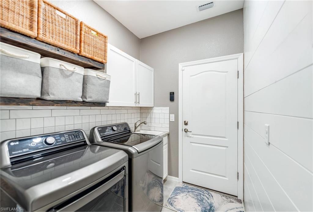 19812 Beechcrest Place Estero, FL 33928 - Photo 36 of 50 a view of a kitchen with appliances