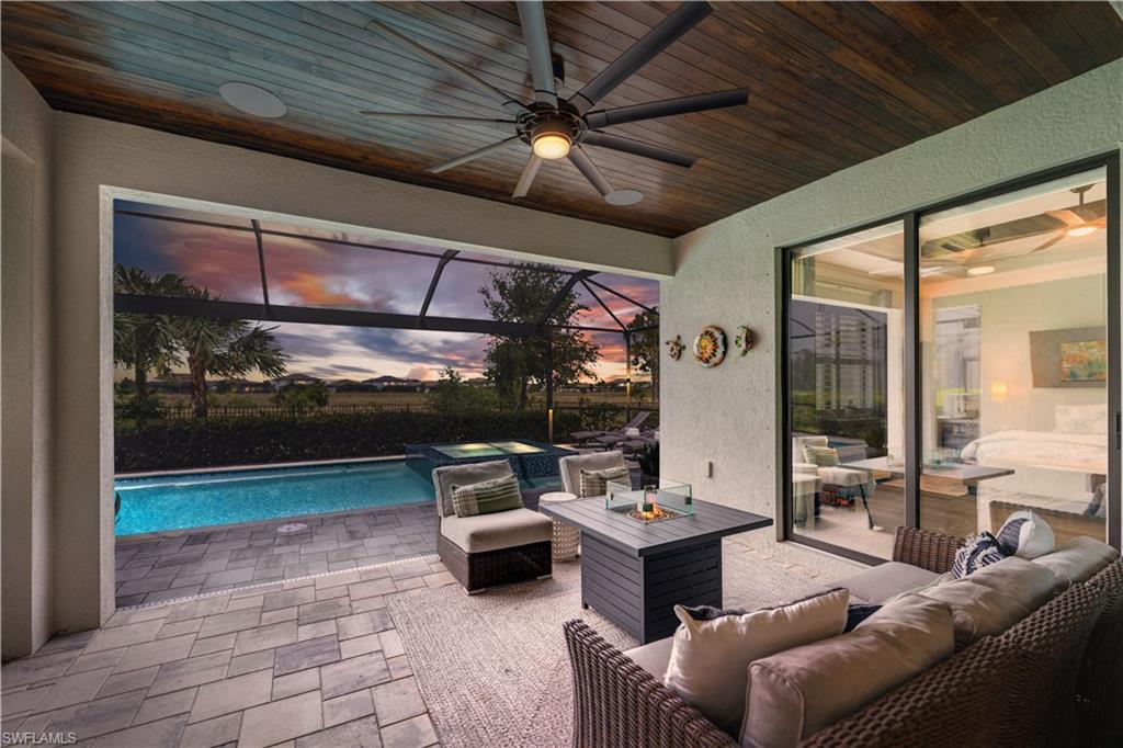 19812 Beechcrest Place Estero, FL 33928 - Photo 39 of 50 a outdoor space with patio couch and a table