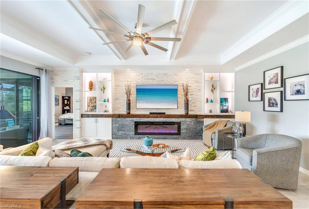 19812 Beechcrest Place Estero, FL 33928 - Photo 6 of 50 a living room with furniture and a large window