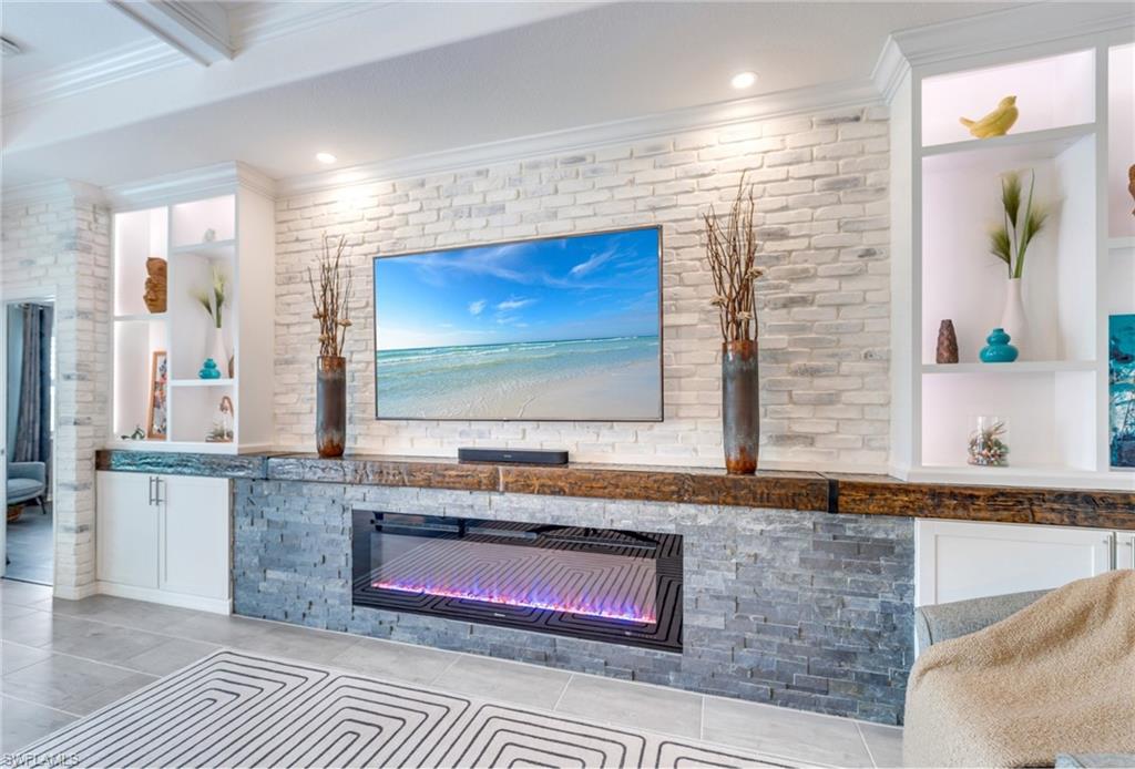 19812 Beechcrest Place Estero, FL 33928 - Photo 7 of 50 a bathroom with a granite countertop sink and a mirror