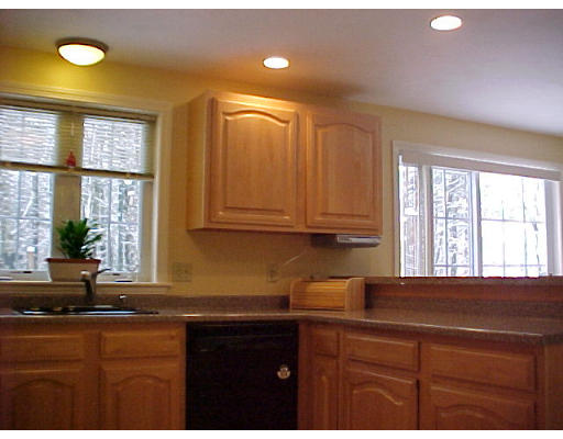 164 Marion Road Middleboro, MA 02346 - Photo 14 of 24 a kitchen with a sink and cabinets