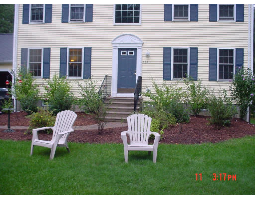 164 Marion Road Middleboro, MA 02346 - Photo 8 of 24 a view of a chair and table in backyard of the house