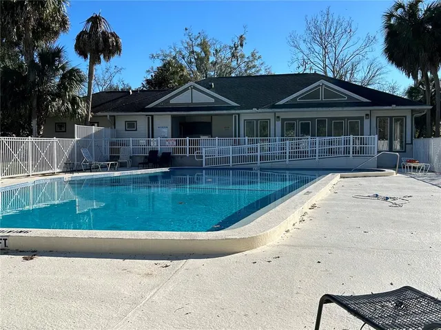 a view of house with yard