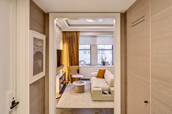 a bathroom with a granite countertop toilet a sink and bathtub