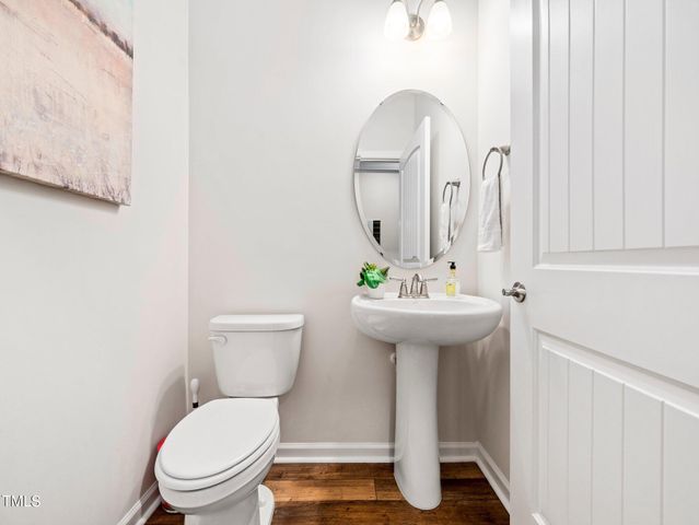 a hallway with wooden floor