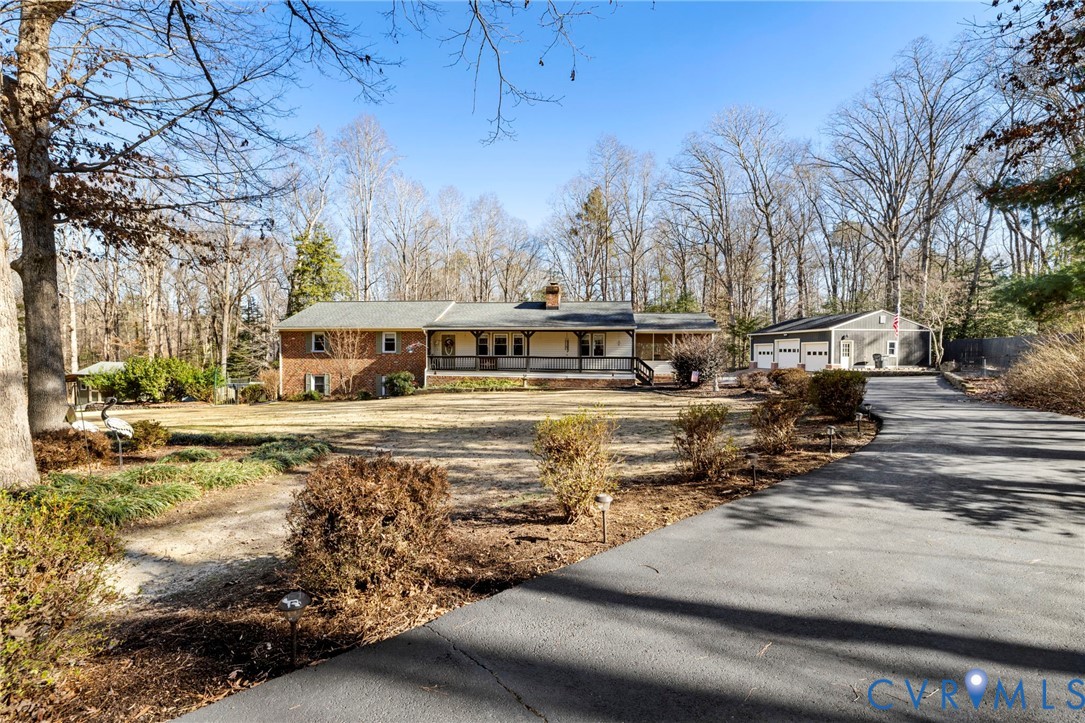 9411 Poly Place Midlothian, VA 23112 - Photo 3 of 39 a view of a town with mountains