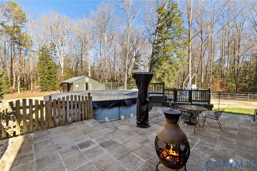 9411 Poly Place Midlothian, VA 23112 - Photo 37 of 39 a view of a patio with iron fence