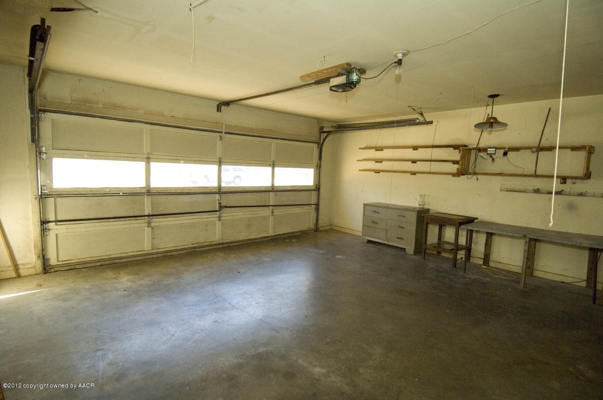 1020 South Rusk Street Amarillo, TX 79102 - Photo 31 of 32 a view of a room with racks on the wall