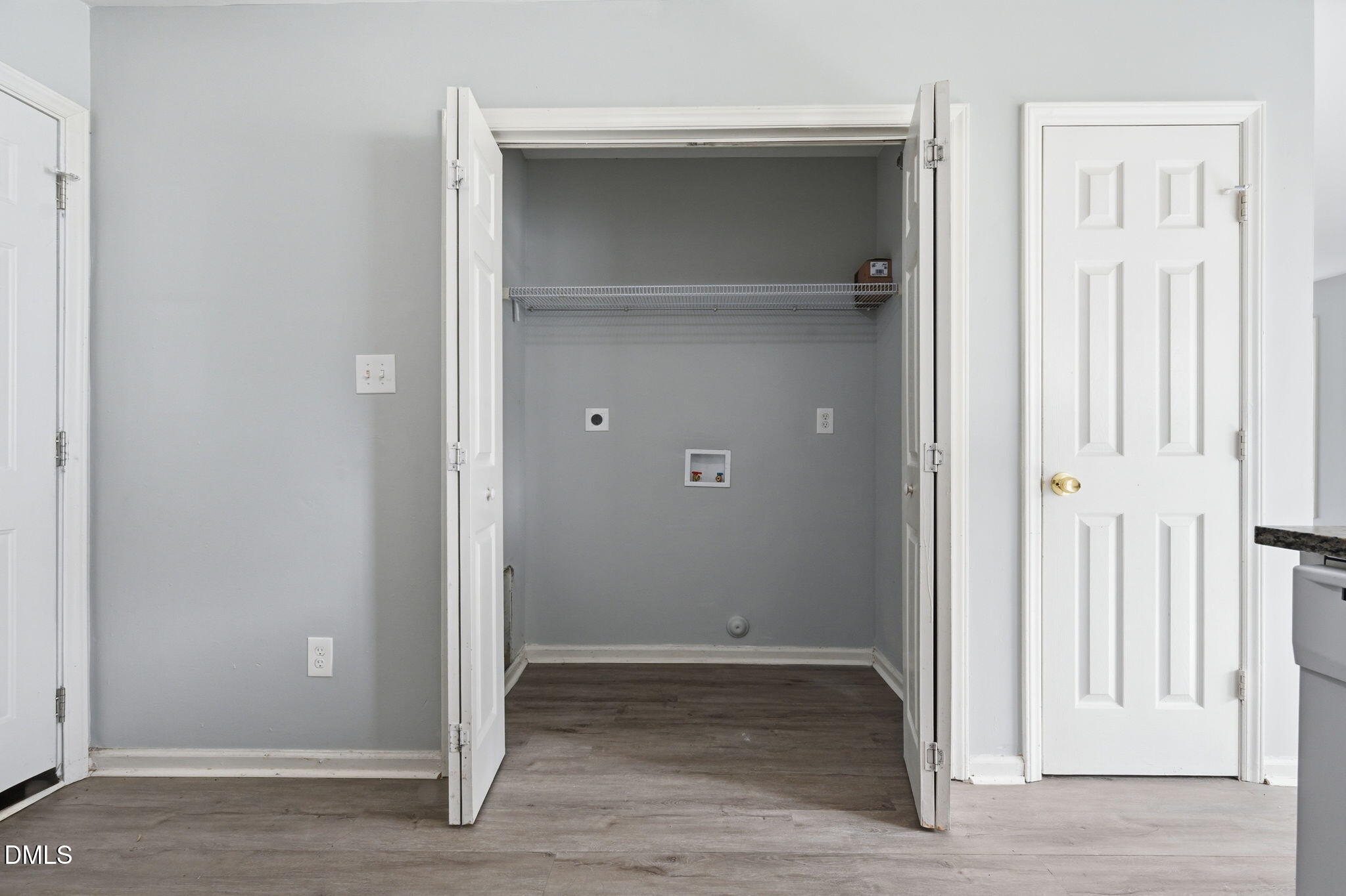2826 Herndon Village Way Raleigh, NC 27610 - Photo 17 of 32 an empty room that has a wooden door