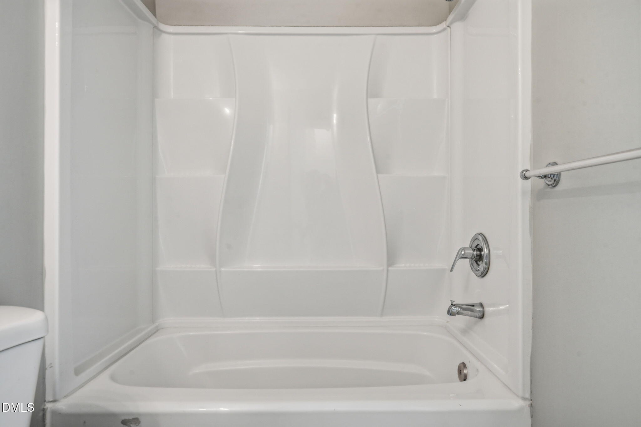 2826 Herndon Village Way Raleigh, NC 27610 - Photo 21 of 32 a close up of a bathtub curtain