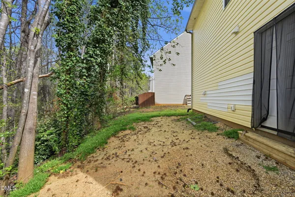 a house with a yard and garage