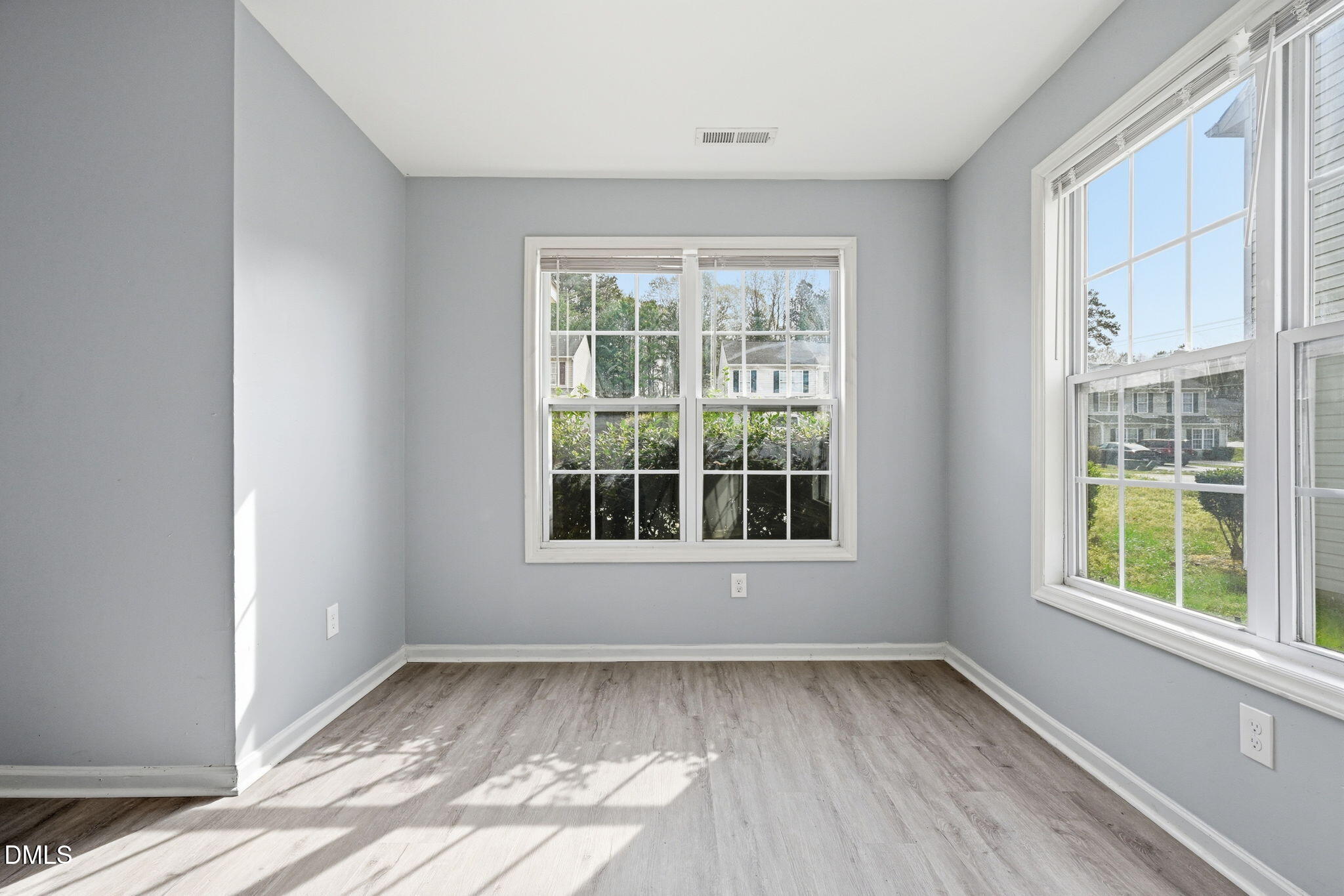 2826 Herndon Village Way Raleigh, NC 27610 - Photo 10 of 32 an empty room with a window