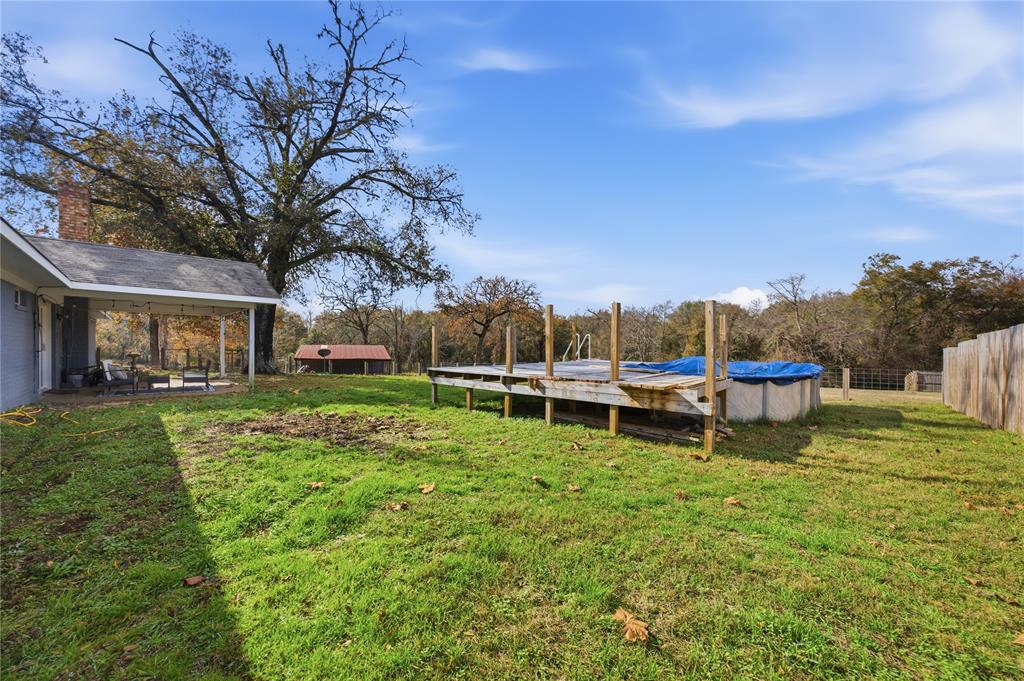 12637 Highway 19 Athens, TX 75752 - Photo 20 of 28 a view of a house with a yard table and chairs