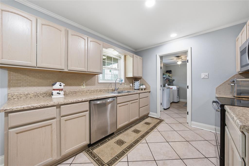 12637 Highway 19 Athens, TX 75752 - Photo 9 of 28 a kitchen with granite countertop white cabinets and white appliances