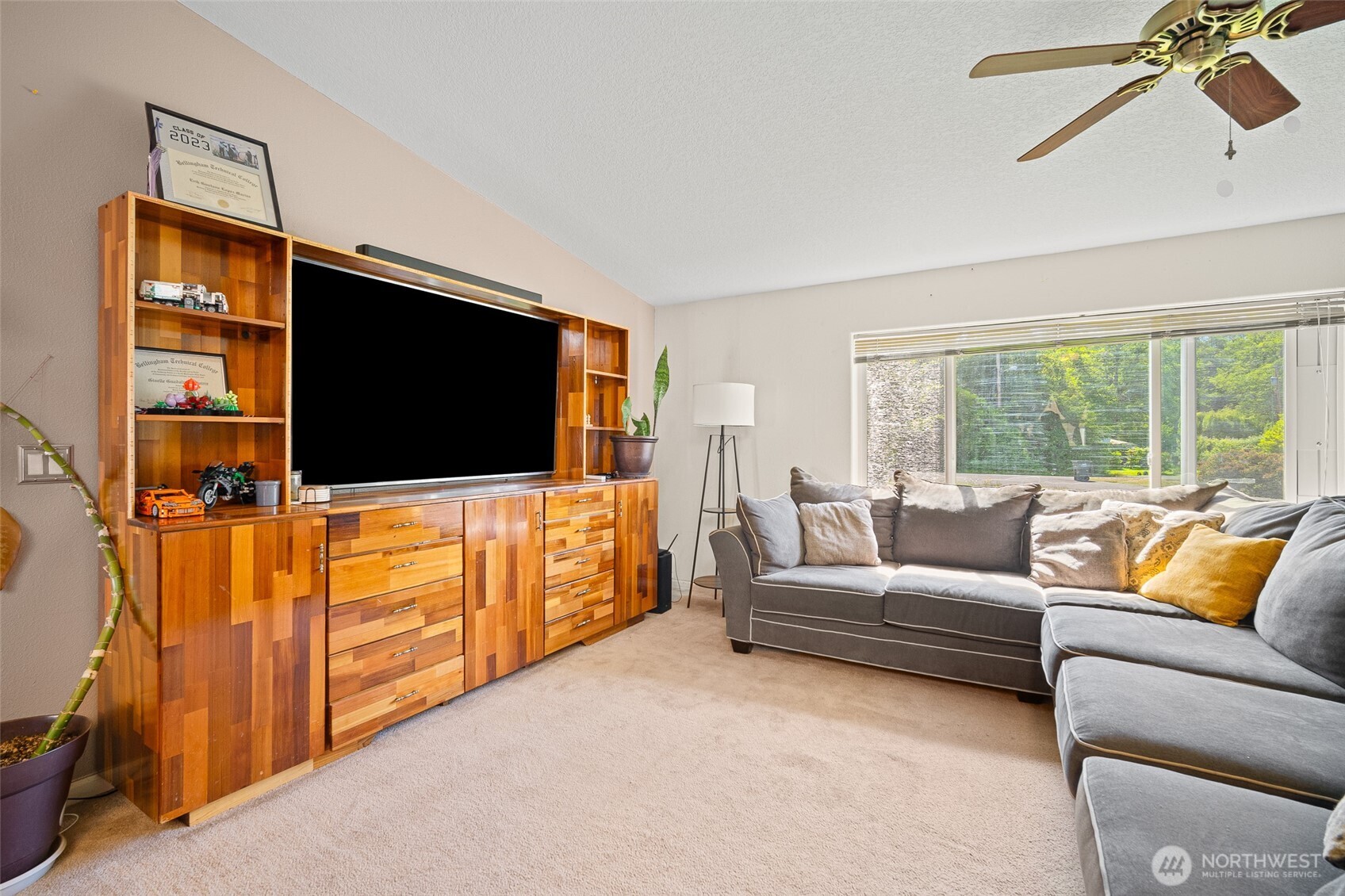 4230 Cody Road Blaine, WA 98230 - Photo 8 of 38 a living room with furniture and a flat screen tv