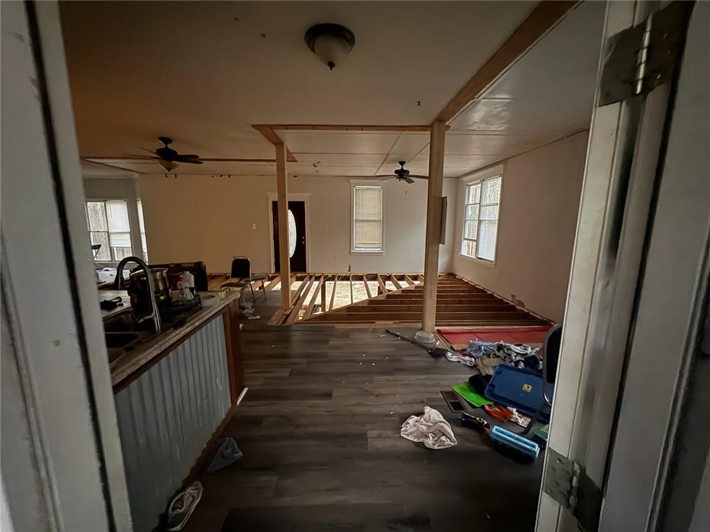 924 Highway 138 Stockbridge, GA 30281 - Photo 3 of 10 a view of a hallway with wooden floor and front door