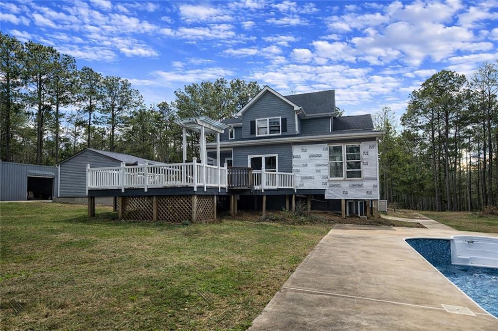 924 Highway 138 Stockbridge, GA 30281 - Photo 8 of 10 a front view of a house with garden