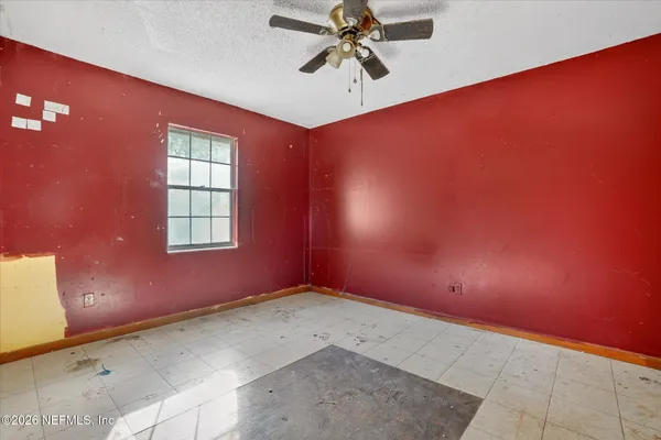 an empty room with windows