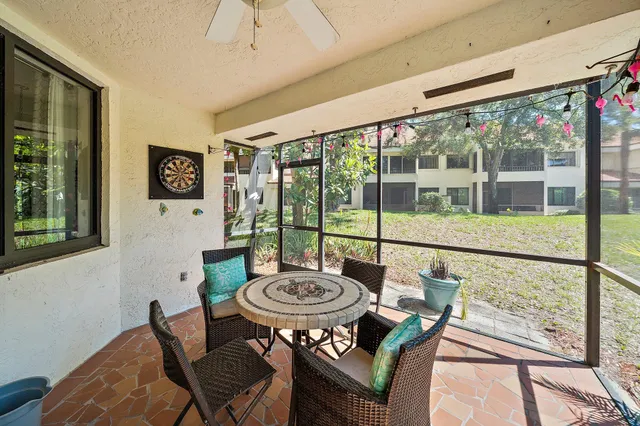 a view of a patio in the backyard