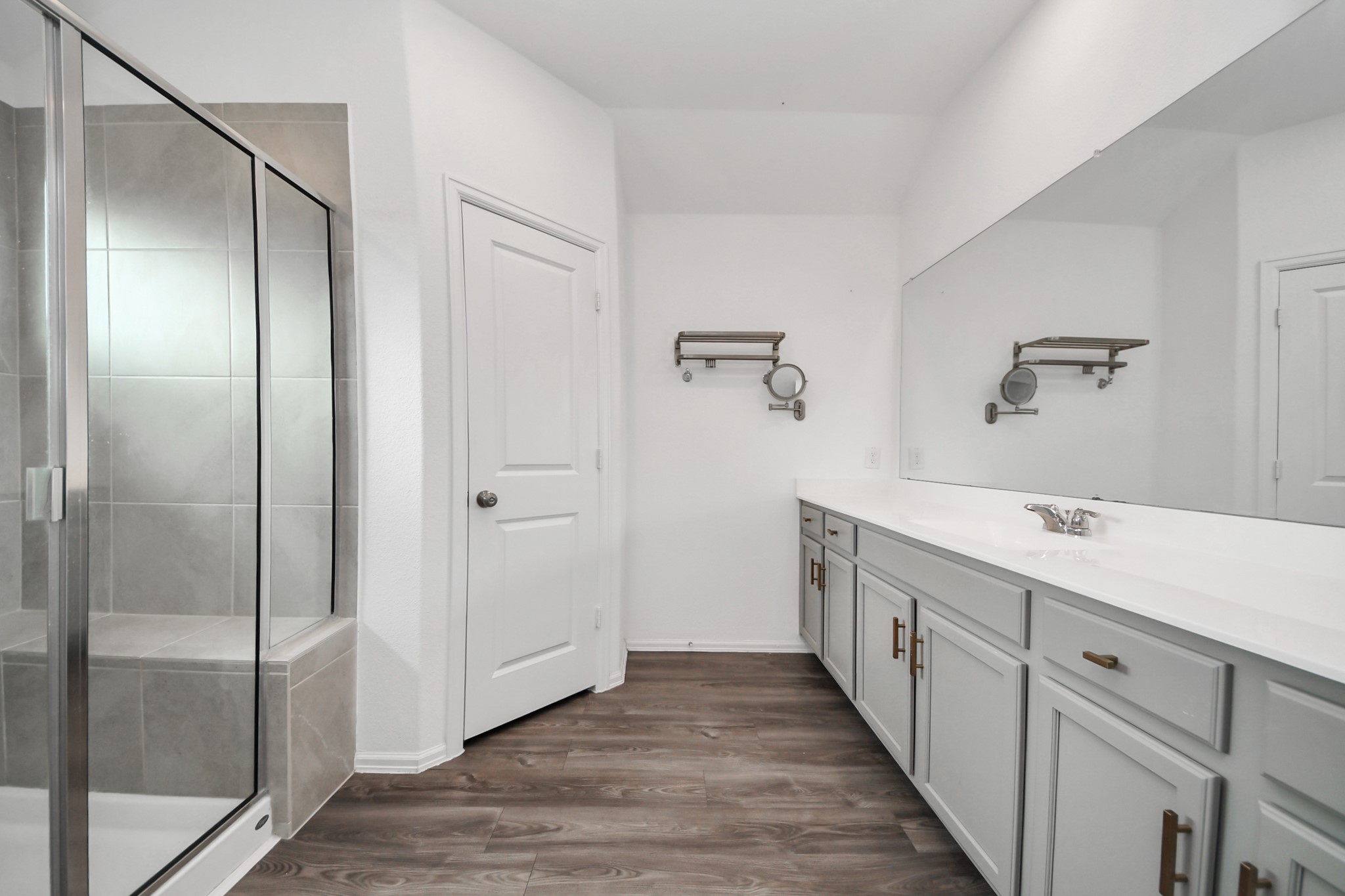 14230 Elrington Holw Trail Rosharon, TX 77583 - Photo 33 of 42 a bathroom with a double vanity sink and mirror