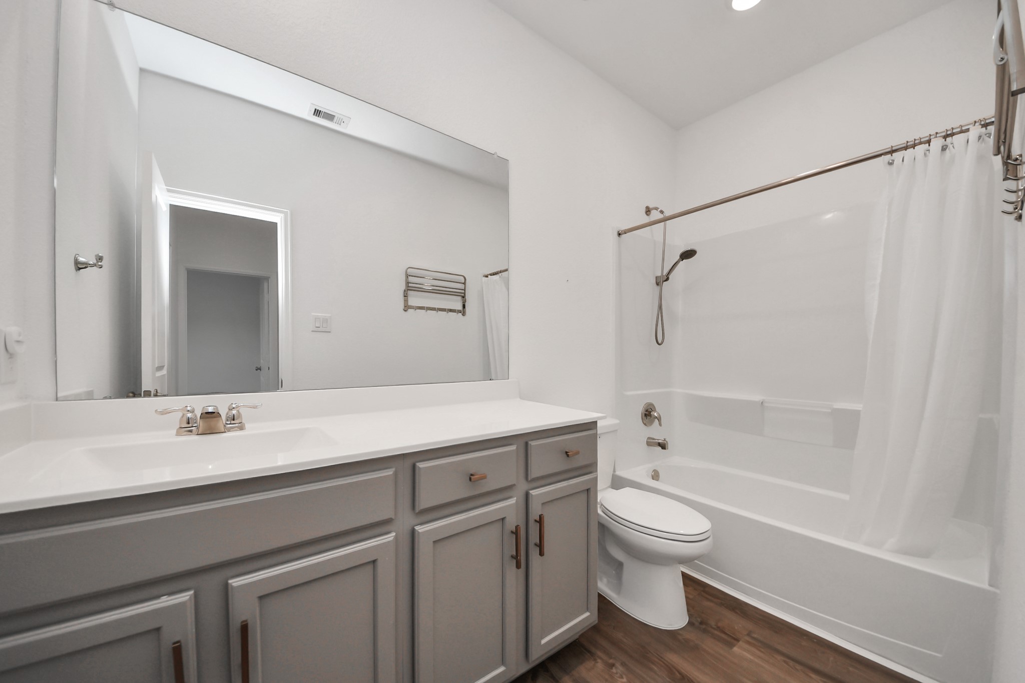 14230 Elrington Holw Trail Rosharon, TX 77583 - Photo 36 of 42 a bathroom with a granite countertop sink toilet a shower and a mirror