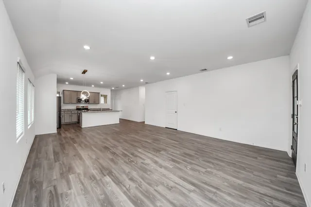 a view of kitchen with wooden floor