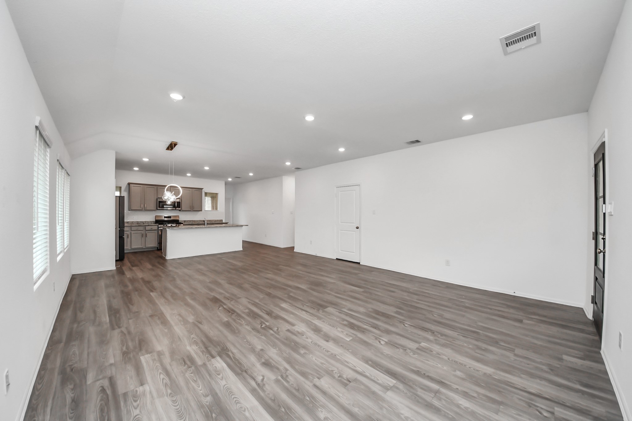 14230 Elrington Holw Trail Rosharon, TX 77583 - Photo 7 of 42 a view of kitchen with wooden floor