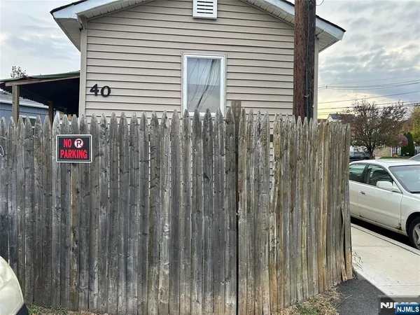 a view of a wooden fence
