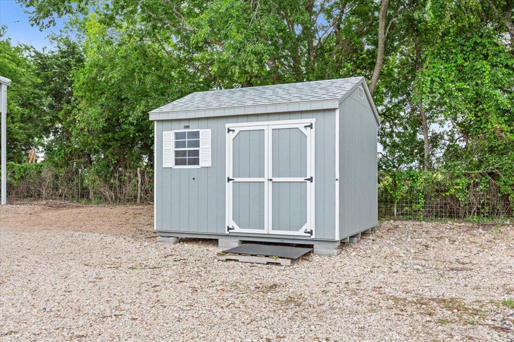 259 County Road 149 Riesel, TX 76682 - Photo 38 of 40 View of shed with view of scattered trees