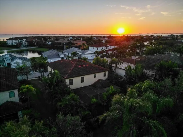 a view of a city and mountains in the background