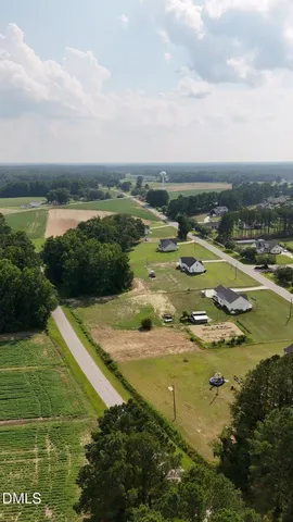 a view of a lake with a yard