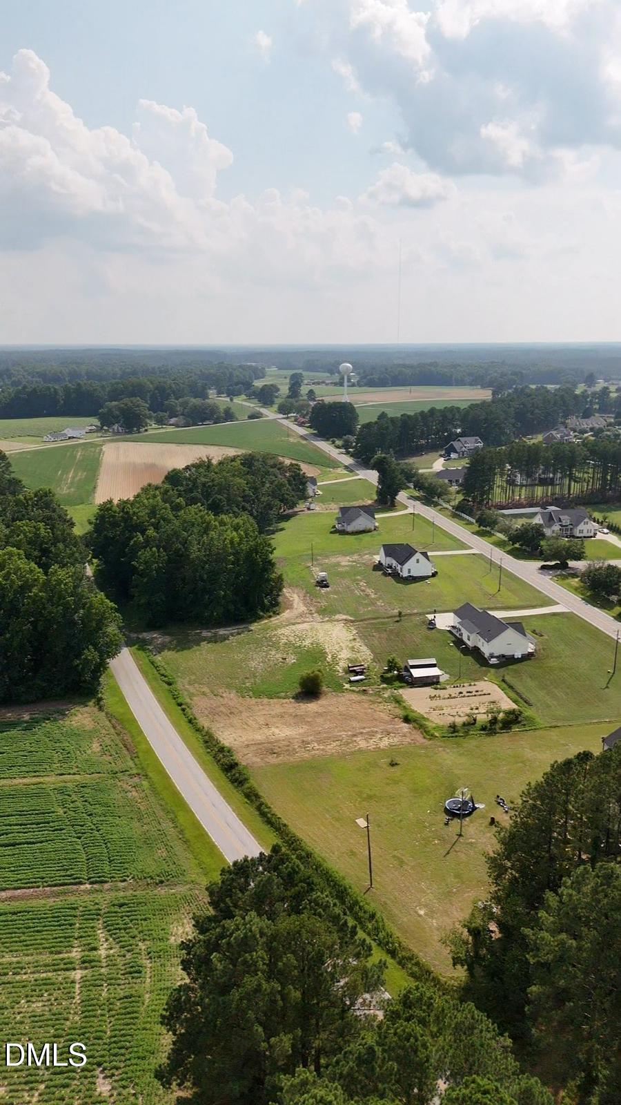 a view of a lake with a yard