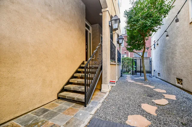 a view of a row of stairs and yard